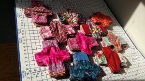 Liners stacked 10 high. Polyurethane laminate or PUL middle. Pockets to insert pad. Wings will have snap installed at assembly location.